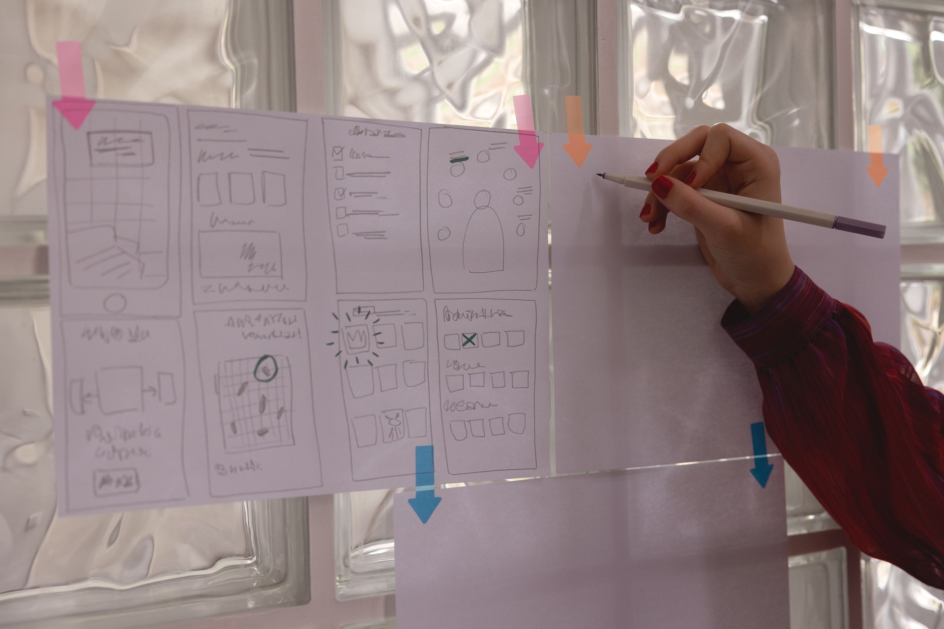 UX expert working on wireframe for mobile